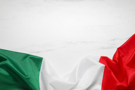 Flag of Italy on white marble background, top view. Space for textの写真素材