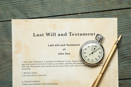 Last Will and Testament, pocket watch and pen on rustic wooden table, top viewの写真素材
