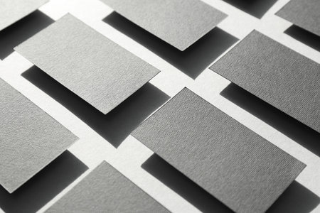 Blank black business cards on light background. Mockup for designの写真素材