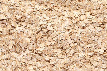 Top view of rolled oats as background