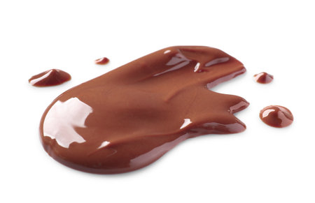 Smear of tasty milk chocolate paste isolated on whiteの写真素材