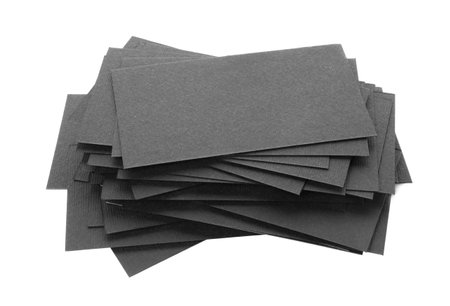 Many blank black business cards isolated on white. Mockup for designの写真素材