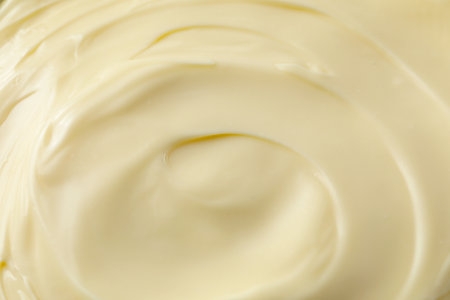 Fresh mayonnaise sauce as background, closeup. Top viewの写真素材