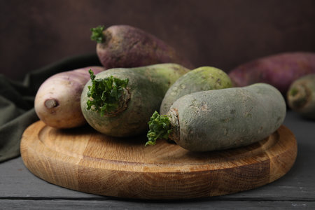 Green and purple daikon radishes on table, closeupの写真素材