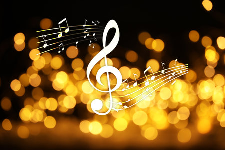 Music notes on dark background, bokeh effectの写真素材