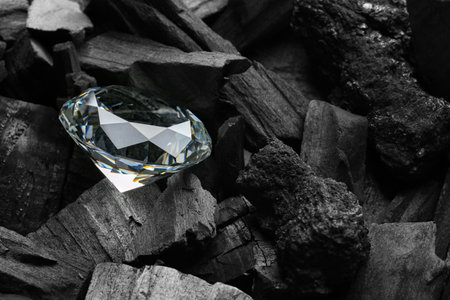 Beautiful shiny diamond on coal, closeup viewの写真素材