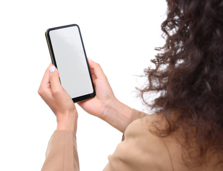 Woman holding smartphone with blank screen isolated on white, closeup. Mockup for designの写真素材