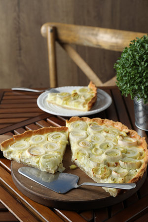 Tasty leek pie served on wooden tableの写真素材