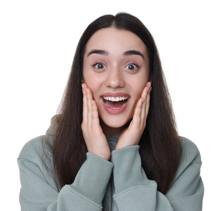Portrait of happy surprised woman on white backgroundの写真素材