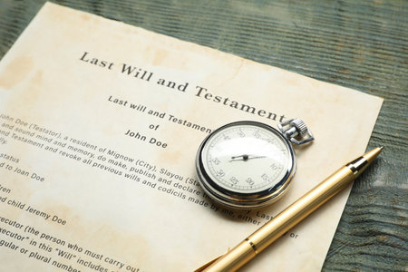 Last Will and Testament, pocket watch and pen on rustic wooden table, closeupの写真素材