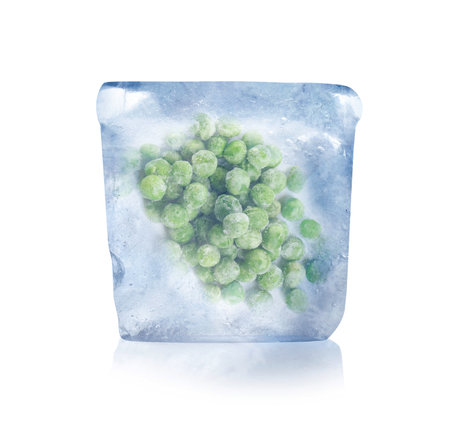 Frozen food. Raw green peas in ice cube isolated on whiteの写真素材