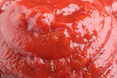 Tasty ketchup as background, closeup. Tomato sauceの写真素材