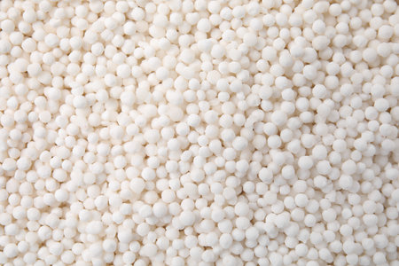 White tapioca pearls as background, top view