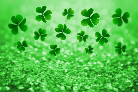 St. Patrick's Day greeting card design with clover leaves, bokeh effect