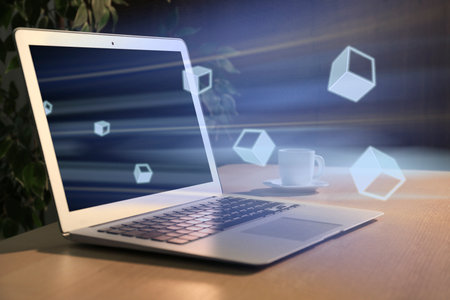 Speed internet. Modern laptop on wooden table. Motion blur effect symbolizing fast connectionの写真素材