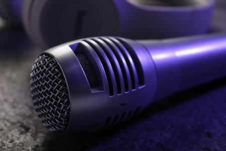 Microphone on gray textured table, closeup. Sound recording and reinforcementの写真素材