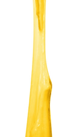 Stretching delicious melted cheese isolated on whiteの写真素材