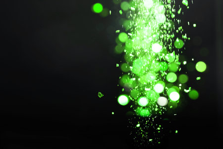 St. St. Patrick's day. Shiny green glitter on black background, bokeh effectの写真素材