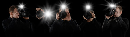 Group of photographers with cameras on black background, banner design. Paparazzi taking pictures with flashesの写真素材