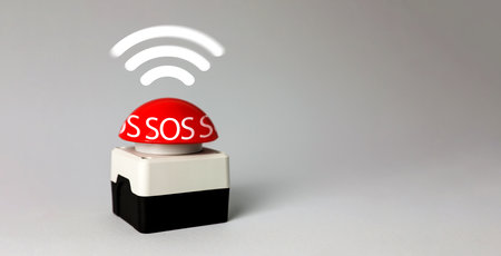 Red SOS button on white background. Banner design with space for textの写真素材