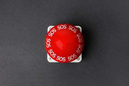Red SOS button on dark gray background. Space for text