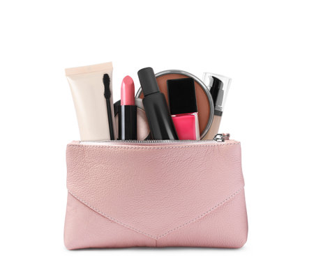 Cosmetic bag filled with makeup products on white backgroundの写真素材