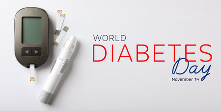 World Diabetes Day. Digital glucometer, lancet pen and test strips on white background, flat lay. Banner designの写真素材