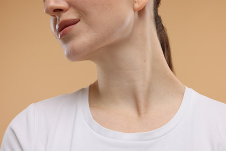 Beauty concept. Woman on beige background, closeupの写真素材