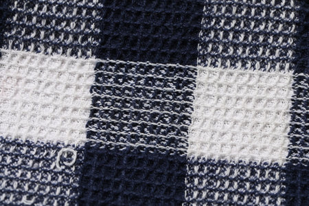 Texture of checkered fabric as background, top view