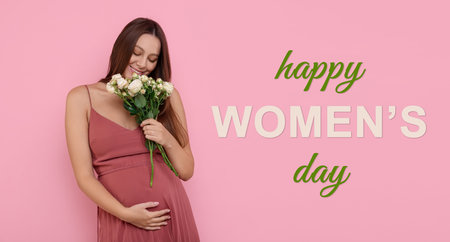 Happy Women's Day, Pregnant lady holding bouquet of beautiful flowers on pink backgroundの写真素材