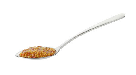 Spoon with fresh whole grain mustard isolated on whiteの写真素材