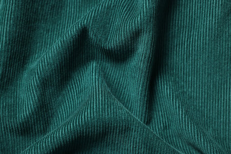 Texture of dark green crumpled fabric as background, top viewの写真素材