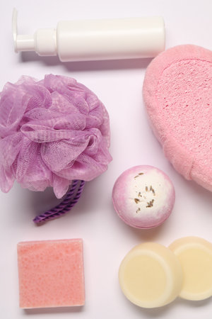 Bath accessories. Different personal care products on white background, flat layの写真素材