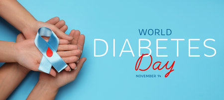 World Diabetes Day. People holding light blue ribbon with paper blood drop on color background, top view. Banner designの写真素材