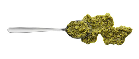 Tasty pesto sauce and spoon isolated on white, top viewの写真素材