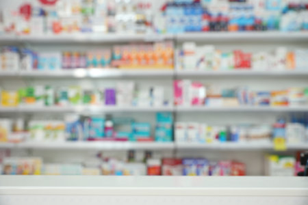 Blurred view of shelves with pharmaceuticals in modern drugstoreの写真素材
