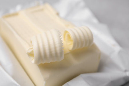 Tasty butter and curls on table, closeupの写真素材