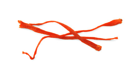Stigmas of aromatic saffron isolated on whiteの写真素材