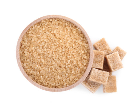 Different types of brown sugar and bowl isolated on white, top viewの写真素材