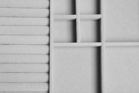 Empty light gray jewelry box as background, top viewの写真素材