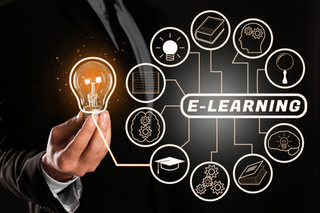E-learning. Man holding lamp bulb on black background, closeup. Illustration of scheme with different iconsの写真素材