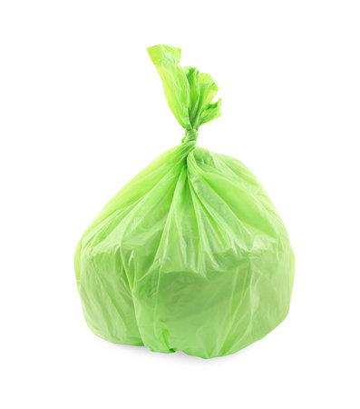 Green plastic garbage bag isolated on whiteの写真素材