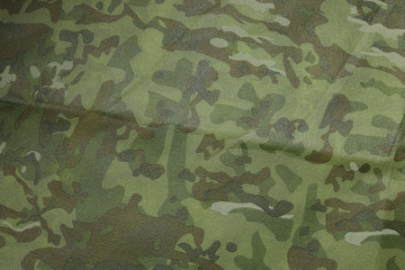 Texture of camouflage fabric as background, top viewの写真素材