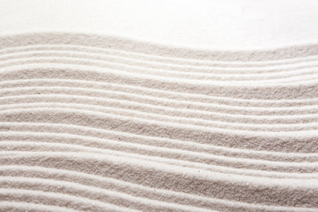Zen rock garden. Wave pattern on white sandの写真素材