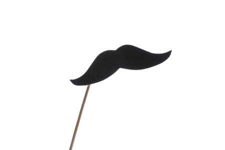 Fake paper mustache on stick against white backgroundの写真素材