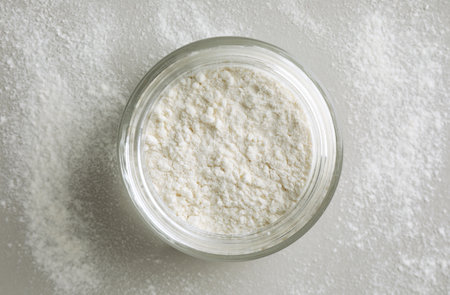 Rice loose face powder on light gray background, top view. Makeup productの写真素材