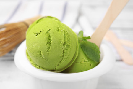 Tasty matcha ice cream in bowl on table, closeupの写真素材