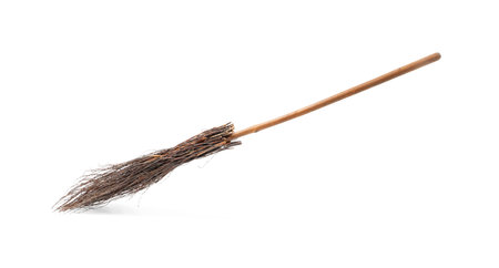 Old broom with wooden handle isolated on whiteの写真素材