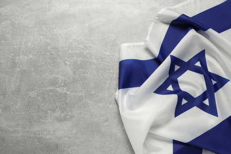 Flag of Israel on gray textured background, top view and space for text. National symbolの写真素材