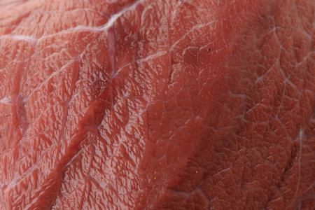Piece of raw beef meat as background, closeupの写真素材